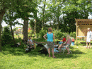 guest drinking coffee in the shade